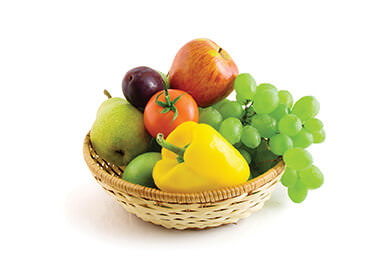 fruits and vegetables in basket isolated on the white background