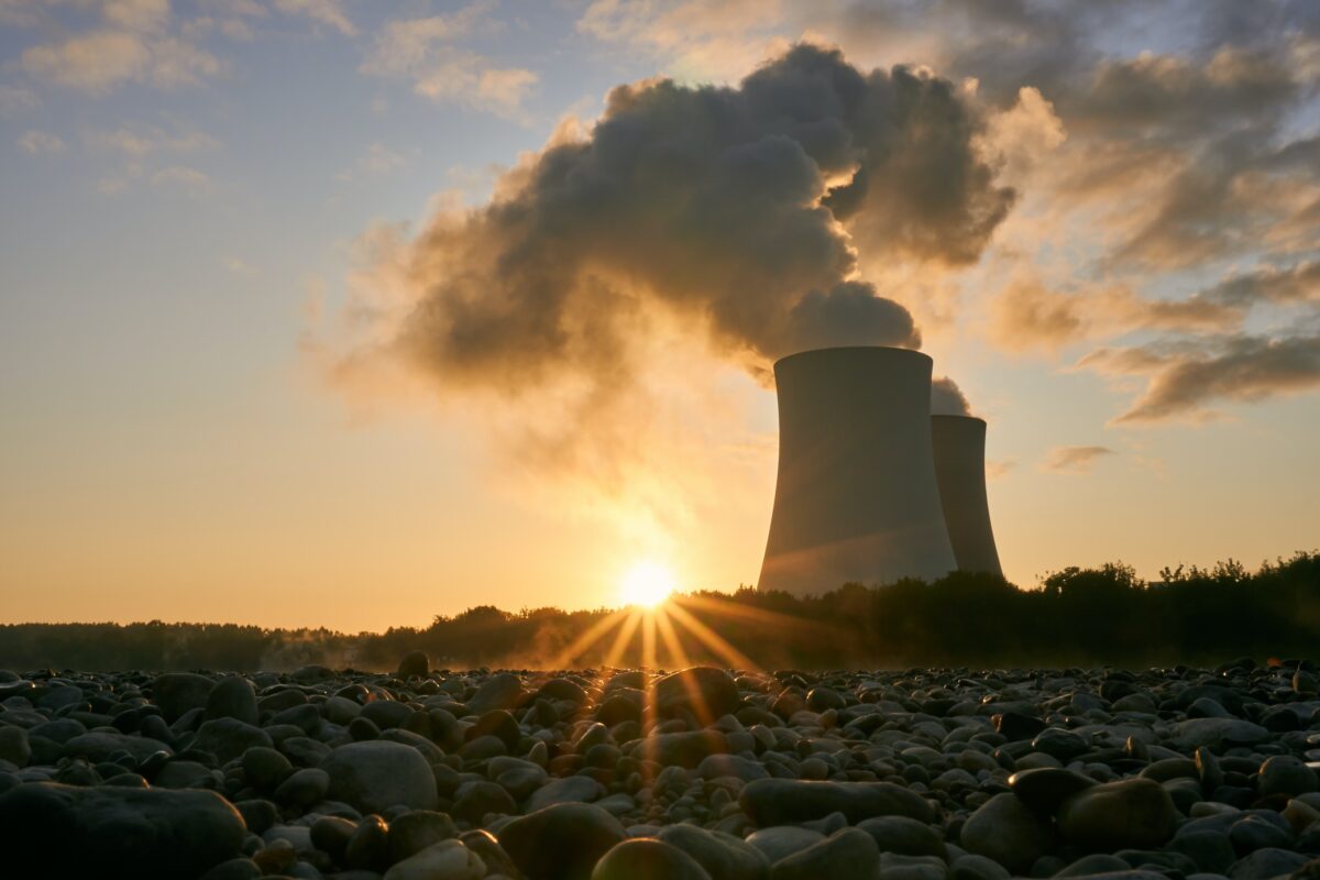 sun setting on nuclear reactor for article on nuclear energy