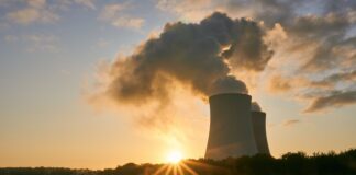 sun setting on nuclear reactor for article on nuclear energy