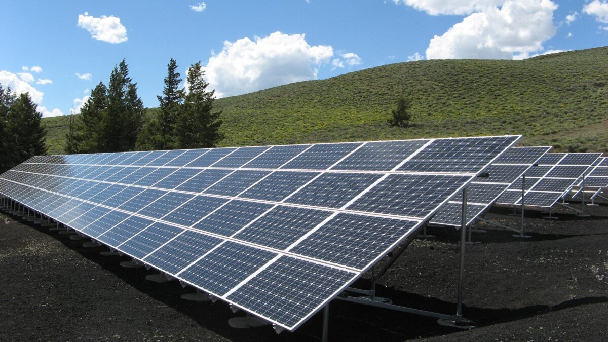 solar panels in field to highlight article on solar tax credits