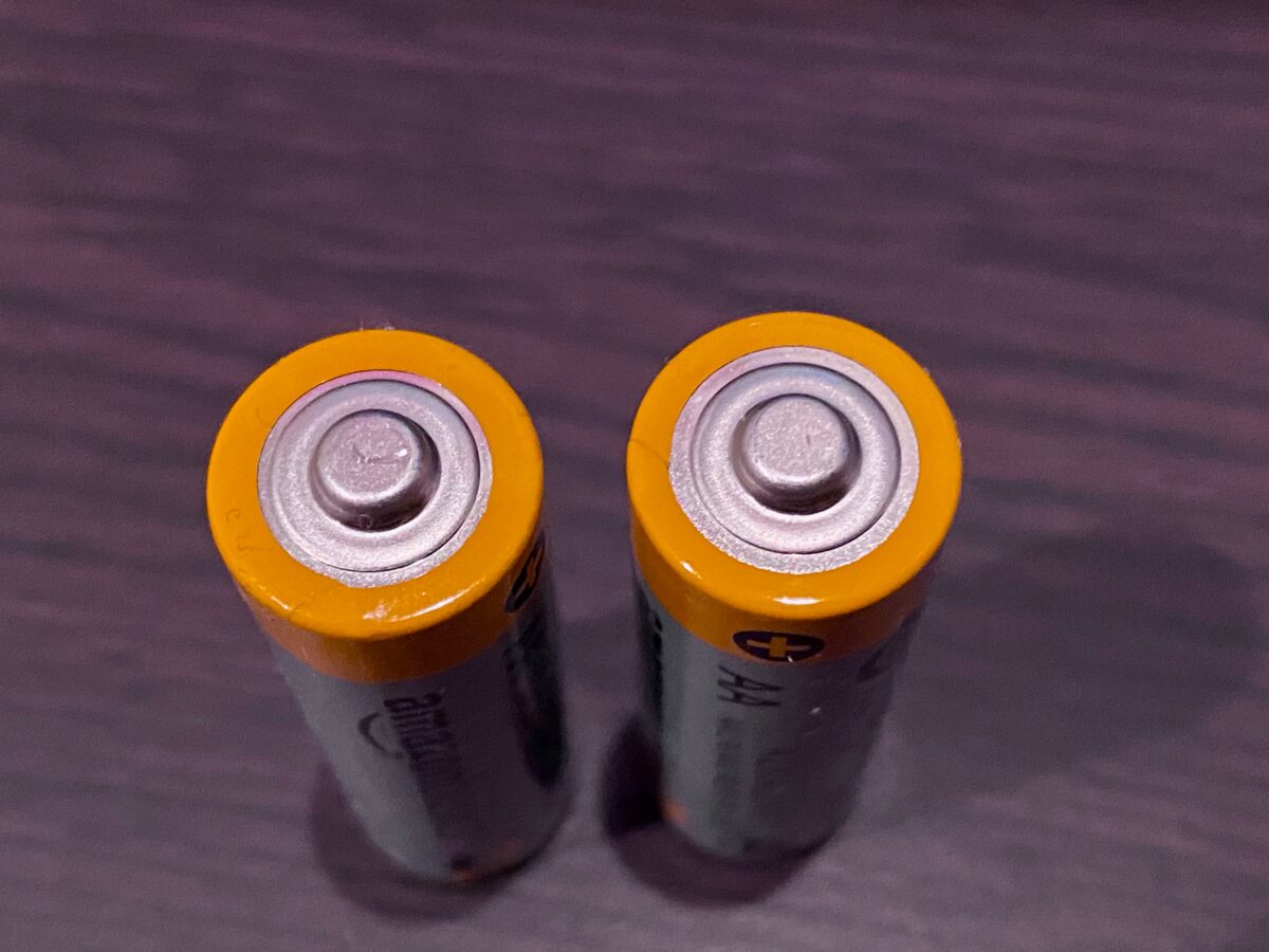 The Huge Need to Develop and Manage U.S. Battery Storage close up of batteries for article on need for battery storage in US for EV vehicles and green energy infrastructure